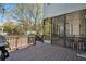 Exterior view of a spacious deck with an entry to the screened-in porch at 2241 Harry Brooks Nw Dr, Atlanta, GA 30318