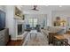 Cozy living room with a fireplace, hardwood floors, and stylish furnishings at 2241 Harry Brooks Nw Dr, Atlanta, GA 30318