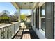 Comfortable porch swing and neighborhood views, a relaxing spot to enjoy the outdoors at 2241 Harry Brooks Nw Dr, Atlanta, GA 30318