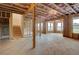 Unfinished basement with exposed beams and studs, ready for customization and finishing touches at 255 Arnewood Cir, Mcdonough, GA 30253