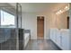 Bright bathroom with double vanity, separate shower and tub, and tile flooring at 255 Arnewood Cir, Mcdonough, GA 30253