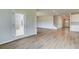 Entryway with luxury vinyl plank flooring, a backyard view through the door, and a staircase at 255 Arnewood Cir, Mcdonough, GA 30253