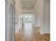 Inviting entryway featuring wood floors, access to the stairs, and an open view of the home's layout at 255 Arnewood Cir, Mcdonough, GA 30253