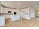 Contemporary kitchen featuring white cabinets, stainless steel appliances, and a center island with breakfast bar at 255 Arnewood Cir, Mcdonough, GA 30253