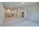 Loft featuring neutral carpet and multiple doorways at 255 Arnewood Cir, Mcdonough, GA 30253