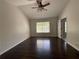 Inviting bedroom with hardwood floors and a view through the window at 262 Bomar Ln, Douglasville, GA 30134