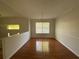 Dining room with hardwood floors, chandelier, and large window at 262 Bomar Ln, Douglasville, GA 30134