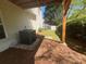 Exterior view from under the deck featuring a white fence and an air conditioning unit at 262 Bomar Ln, Douglasville, GA 30134
