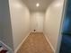 The hallway features unique flooring and a door at the end at 262 Bomar Ln, Douglasville, GA 30134