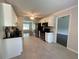 Spacious kitchen featuring white cabinets and stainless steel appliances at 262 Bomar Ln, Douglasville, GA 30134
