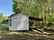Detached shed with attached lean-to in back yard at 262 Bomar Ln, Douglasville, GA 30134