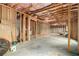 The basement is unfinished with exposed wood framing and utilities at 4604 Marching Ln, Fairburn, GA 30213
