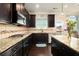 Gourmet kitchen featuring stainless steel appliances and granite countertops at 4604 Marching Ln, Fairburn, GA 30213