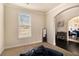 The living room features a window and an archway leading to the dining room at 4604 Marching Ln, Fairburn, GA 30213