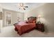 Comfortable bedroom with soft carpet, natural light, and traditional furnishings at 4900 Fairmont Way, Roswell, GA 30075