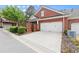 Home has a two car garage and long concrete driveway at 4900 Fairmont Way, Roswell, GA 30075