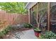 Enclosed patio area features a table and chairs and privacy fence at 4900 Fairmont Way, Roswell, GA 30075