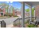 Scenic view from the porch, showcasing the neighborhood's architecture and lush greenery at 4900 Fairmont Way, Roswell, GA 30075