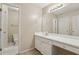 Bathroom featuring a vanity with a large mirror and lighting fixture, alongside a toilet at 100 Julia Ct, Fayetteville, GA 30214