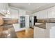 A kitchen with stainless steel appliances, granite countertops and hard wood floors at 100 Julia Ct, Fayetteville, GA 30214
