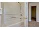 Full bathroom with a shower and bathtub combo and a closet entrance at 137 Venture Path, Hiram, GA 30141