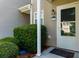 Exterior of home entrance featuring well manicured bushes and clear numbering at 137 Venture Path, Hiram, GA 30141