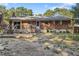 Well-maintained backyard with a brick home exterior, patio, and partial fencing at 37 Crystal River Dr, Riverdale, GA 30274
