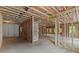 Unfinished basement with framing and insulation, offering a blank canvas for customization at 6120 Hutchins Dr, Buford, GA 30518