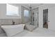 Bright bathroom featuring a freestanding tub and a large shower with glass surround at 6120 Hutchins Dr, Buford, GA 30518