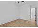 Bedroom featuring light wood floors at 6120 Hutchins Dr, Buford, GA 30518
