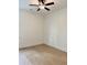 Bright bedroom featuring a ceiling fan and light hardwood floors for a cozy aesthetic at 6120 Hutchins Dr, Buford, GA 30518