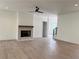 Living room featuring a fireplace and wood floors at 6120 Hutchins Dr, Buford, GA 30518