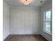 Bonus room with hardwood floors and white molding at 6120 Hutchins Dr, Buford, GA 30518