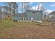 The rear of the house is visible from the backyard at 670 Westbrook Pl, Lawrenceville, GA 30044