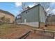 View of the rear exterior of the house and tiered backyard at 670 Westbrook Pl, Lawrenceville, GA 30044