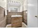 Beautiful bathroom vanity featuring a sink, drawers, and lots of light at 670 Westbrook Pl, Lawrenceville, GA 30044