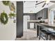 Cozy kitchen featuring black cabinets, an eat-in table, and natural light at 670 Westbrook Pl, Lawrenceville, GA 30044