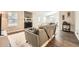 Cozy living room with a stone fireplace and modern furniture at 9053 Franklin Ct, Jonesboro, GA 30238