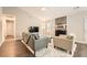 Inviting living room features a stone fireplace and vaulted ceilings at 9053 Franklin Ct, Jonesboro, GA 30238