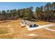 Aerial view of home with garage and spacious deck at 96 Sam Alexander Rd, Douglasville, GA 30134