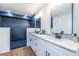 Contemporary bathroom featuring a tiled shower, double vanity with granite counters, and modern fixtures at 96 Sam Alexander Rd, Douglasville, GA 30134