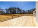 Spacious wooden deck perfect for outdoor entertaining, with views of the surrounding greenery at 96 Sam Alexander Rd, Douglasville, GA 30134
