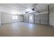 Spacious garage with high ceilings, multiple doors, and window at 96 Sam Alexander Rd, Douglasville, GA 30134