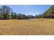 Scenic acreage with a charming pond and open field, perfect for outdoor activities and serene country living at 96 Sam Alexander Rd, Douglasville, GA 30134