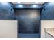 Large walk-in shower with stylish dark tiling and multiple shower heads, for a luxurious experience at 96 Sam Alexander Rd, Douglasville, GA 30134