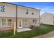 View of the backyard and patio area of the townhome at 300 Shine Dr, Stockbridge, GA 30281