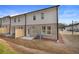 View of the backyard and patio area of the townhome at 300 Shine Dr, Stockbridge, GA 30281