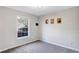 This bedroom boasts neutral walls and flooring at 3337 Camens Way, Buford, GA 30519