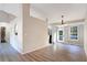 Bright, open-concept dining area with sleek flooring, and access to the outdoor patio at 3337 Camens Way, Buford, GA 30519