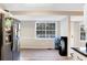 Updated kitchen features stainless steel appliances, including large refrigerator, and a view to the backyard at 3337 Camens Way, Buford, GA 30519